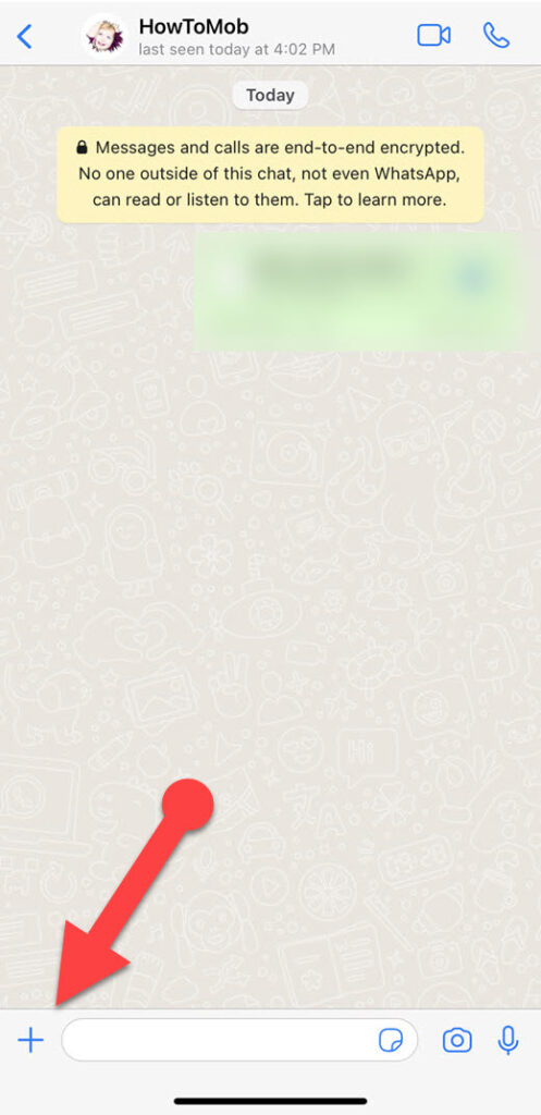 Where is the attach button on WhatsApp iPhone?